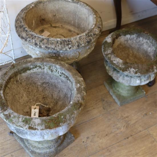 A campana urn shaped planter and two other planters W.46cm, 40cm and 35cm
